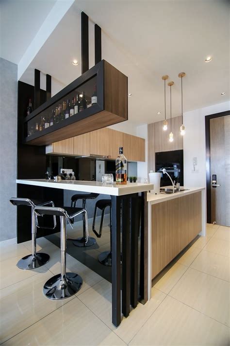 Modern Kitchen Design With Integrated Bar Counter For A Small Condo