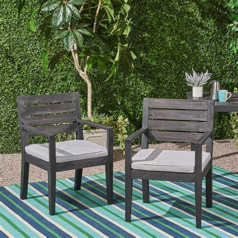 The seats and backs are padded and button tufted. Zoe Outdoor Acacia Wood Dining Chairs with Cushions,, Set ...