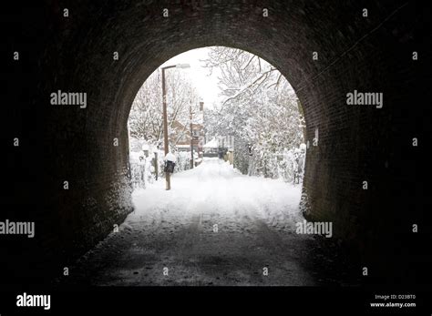 A Snowy Scene Seen Through A Tunnel Stock Photo Alamy