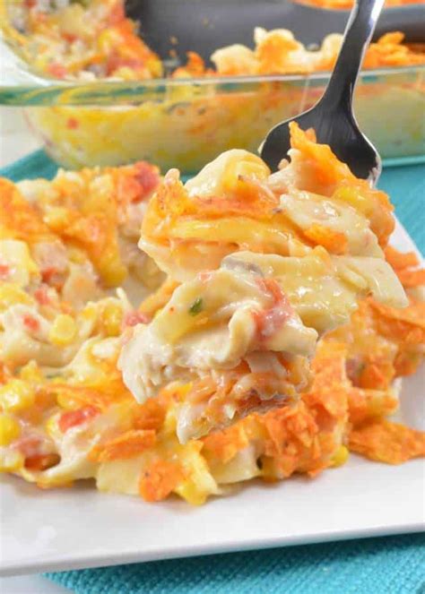 Nacho cheese dorito chicken casserole is a creamy, cheesy, and crunchy casserole recipe with shredded chicken, condensed cream of chicken, cheddar cheese, rotel tomatoes, enchilada sauce, and loads of crunchy and spicy nacho cheese doritos. Doritos Cheesy Chicken Casserole | Dinner | The Best Blog ...