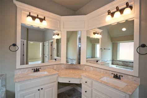Double sink bathroom vanity cabinets are often mounted one above the other with space left for towels (and bottle traps) between. Master Bath with Corner Vanity and Double Sinks ...