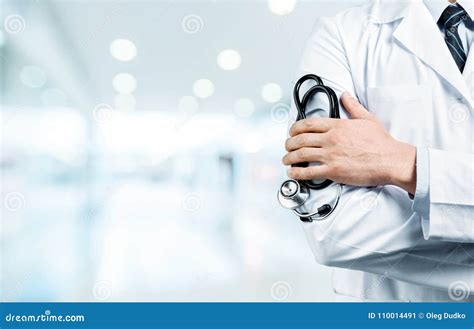 Young Man Doctor Holding Stethoscope Stock Image Image Of Looking