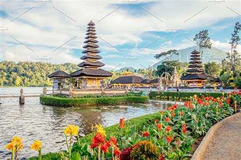 The temple dates back to 1633 and is used for water offerings to balinese goddess of dewi danu, who is . Pura Ulun Danu Bratan, Hindu temple surrounded by flowers ...