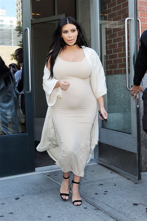 Pregnant Kim Kardashian Shows Off Her Ample Assets And Aa