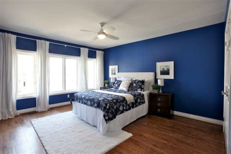 Accent the space with darker features. 20 Gorgeous Blue Bedroom Ideas