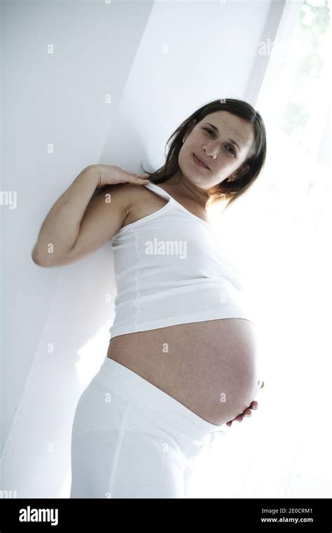 Great Britain England London Pregnant Woman Standing Next To