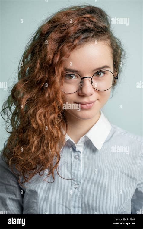 Close Up Portrait Of Ginger Stylish Schoolgirl Wearing Glasses Stock