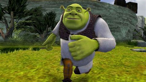 Shrek Is Running On Green Grass In Rocks Background Hd Shrek Wallpapers