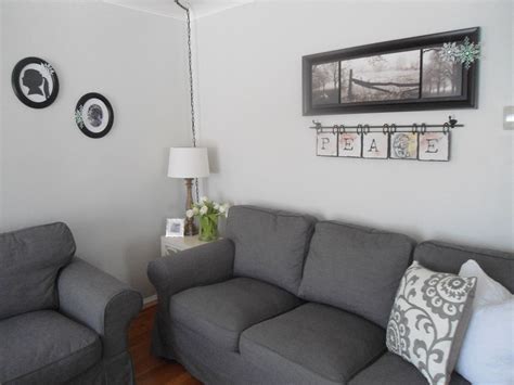 Don't let your small living room cramp your style. Neutral living room - paint color is Benjamin Moore Gray ...