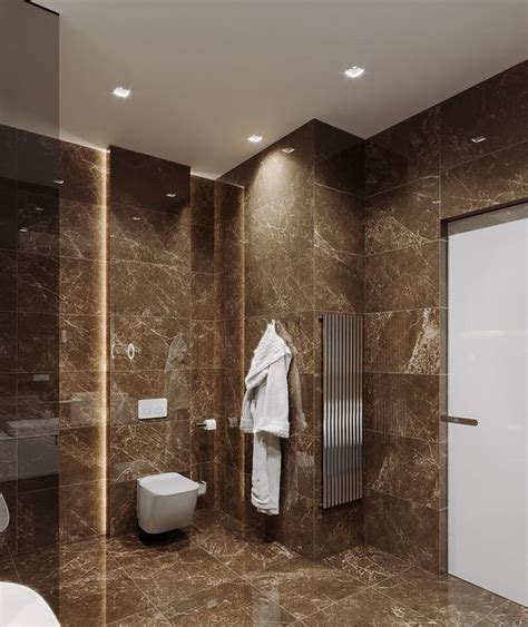 A Contemporary Brown Bathroom Clad With Brown Marble Tiles With White
