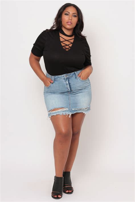 This Plus Size Stretch Denim Skirt Features A Zip Fly With Button