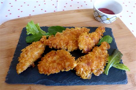Recette de Poulet pané aux corn - flakes au four