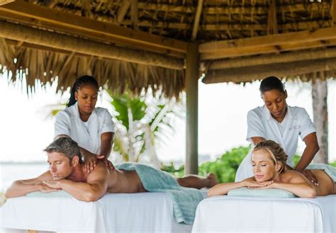 enjoy a couples massage on the beach with the red lane® spa escape caribbean beach resort