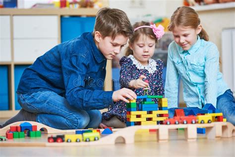 Children Playing With Blocks Indoors Stock Image Image Of