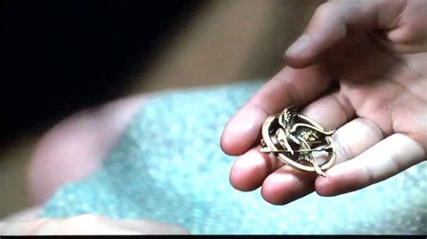 All the hunger games movies, in order of release. The Hunger Games: Prim's Mockingjay Pin Scene - YouTube