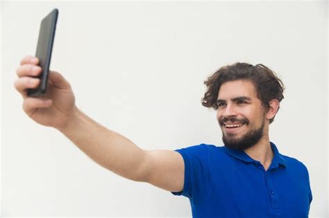Free Photo Cheerful Guy Taking Selfie On Mobile Phone