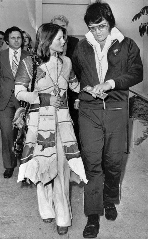 Elvis And Priscilla Presley Walking Out Of Court After Their Divorce