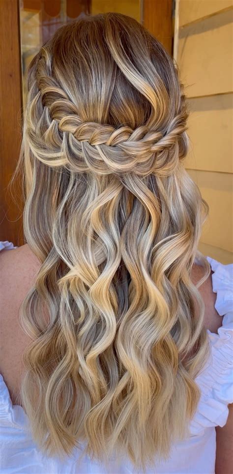 40 Best Prom Hairstyles For 2023 Curly Wave Textured Half Up Half Down