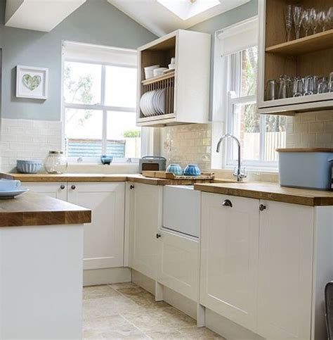 In the past, stained natural wood cabinets dominated every kitchen. cream kitchen cabinets gray walls - Google Search | Blue ...