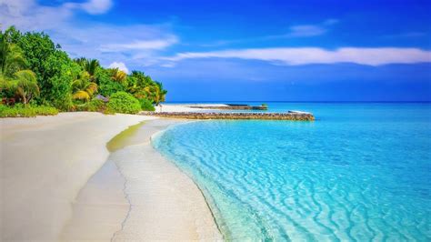Magnificent Tranquil Beach On A Stunning Blue Ocean 1920x1080 Wallpaper