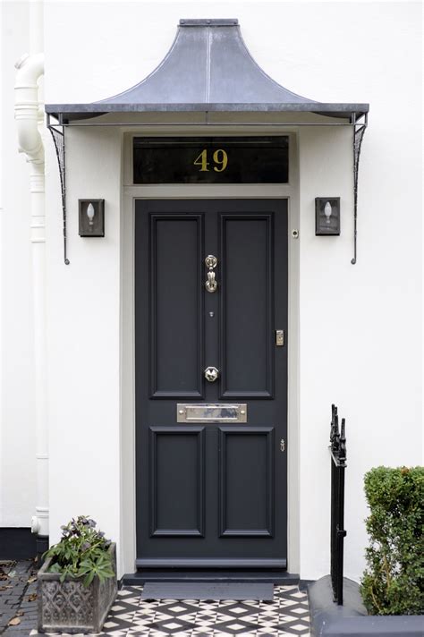 The front door canopy is the crowning touch of the entrance area of a home. Door Canopies - Canopy Designs From in 2019 | Porch canopy ...