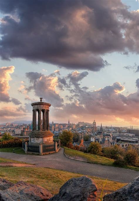 Panorama Of Edinburgh Against Sunset With Calton Hill And Castle In
