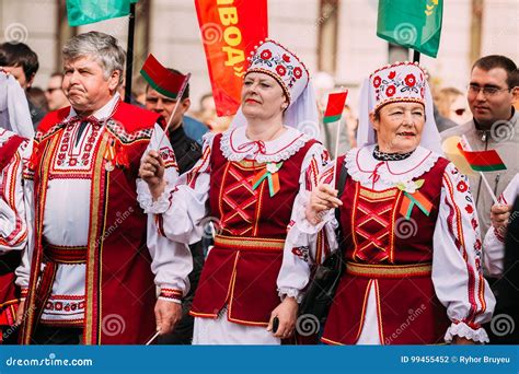 People In National Belarusian Folk Costume Participating In The