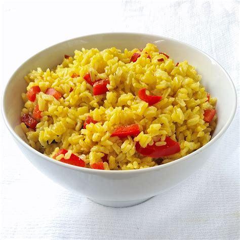 Yellow rice with sausage featuring johnsonville's new orleans brand, andouille smoked sausage! Yellow Rice with Red Bell Peppers | Food recipes, Healthy ...