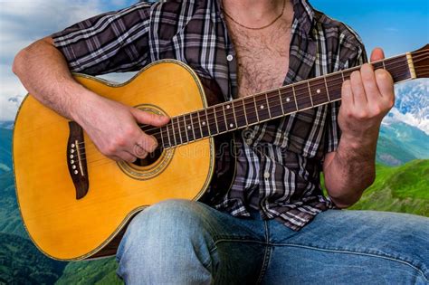 Young Man Playing Acoustic Guitar Stock Photo Image Of Handsome