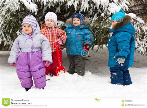 Children Playing In Snow Outdoor Stock Photos Image
