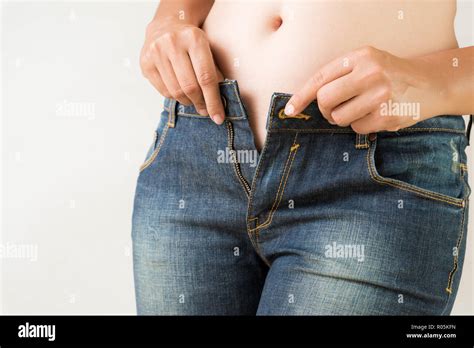 Woman Weight Gain Jeans Hi Res Stock Photography And Images Alamy