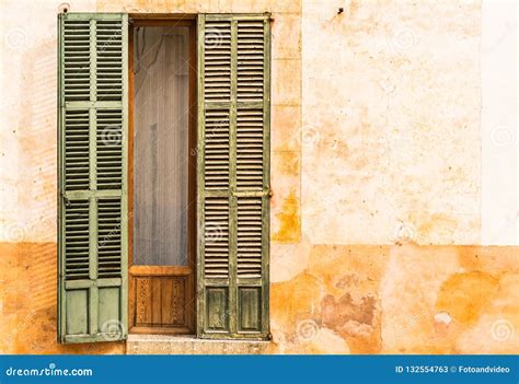 Rustic Old Open Window Shutter Of Mediterranean House Stock Image