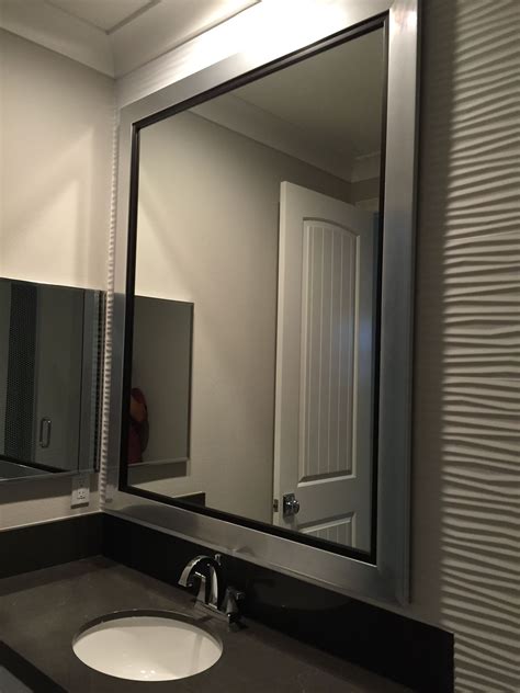 Quite literally reflective, a bathroom mirror is a traditional and functional addition to full baths and powder rooms alike. Custom Silver Framed Mirror, Bathroom #westframes | Silver ...