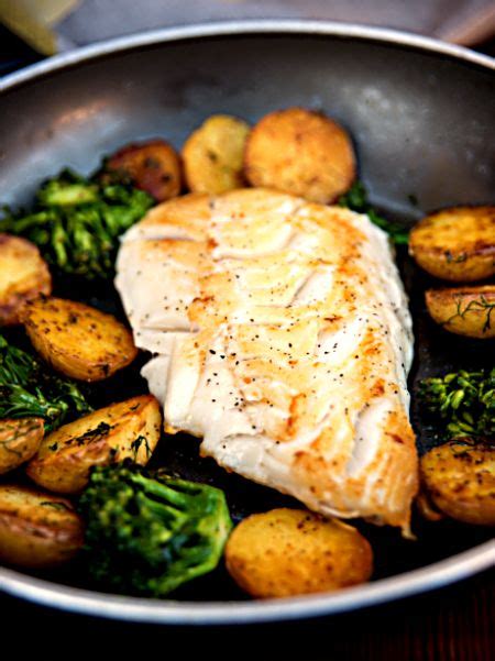 Wild Black Cod Sautéed Fillet Served With Potatoes And Broccoli Foodal
