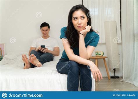 Unhappy Asian Woman In Bed And Feeling Bored And Grumpy Her Husband