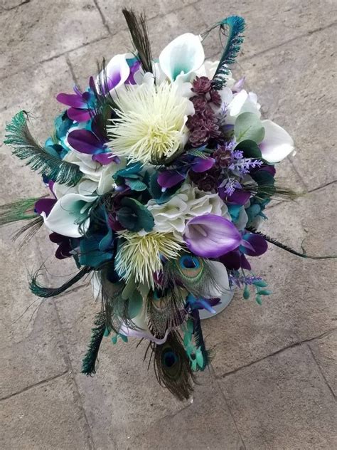 Shop artificial plants & flowers by color or vessel. Purple, teal, peacock bridal bouquet, round, cascading ...