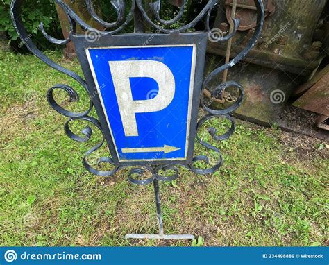 Blue Parking Sign With A Metal Detail Around Stock Image Image Of