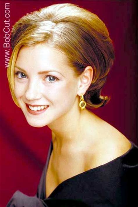 Maybe you would like to learn more about one of these? She has short blonde hair cut in a layered bob. Most of ...