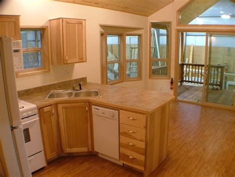 Circle e buildings is a portable building manufacturer specializing in portable sheds, lofted barns, cabins and garages. Spacious Park Model Tiny Cabin on Wheels by RPC