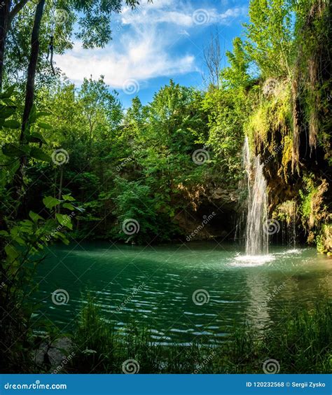 Waterfall And A Beautiful Lagoon Lake For Relaxing In The Summer Stock