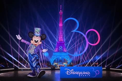 Mickey Mouse Dancing In Front Of The Eiffel Tower At Disneyland Worlds