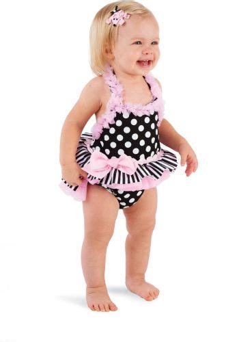 Features we're all about the tutu bathing suit for girls featuring an allover print of minnie mouse with her iconic bow. Mudpie swimsuit .. available via runwayzboutique.com ...