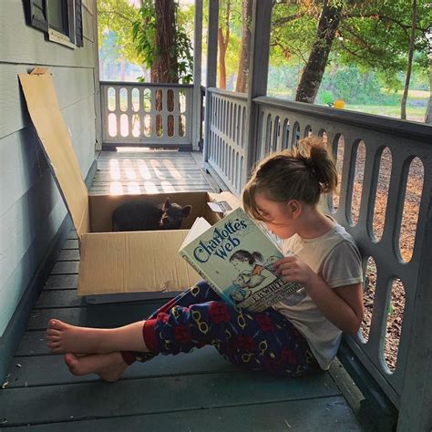 caught reading on the porch with her new friend pics
