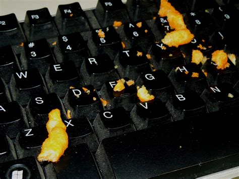 Cheeto Crumbs On The Keyboard