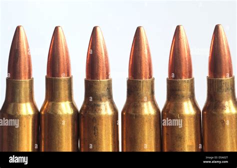 Row Of Rifle Bullets On White Background Stock Photo Alamy