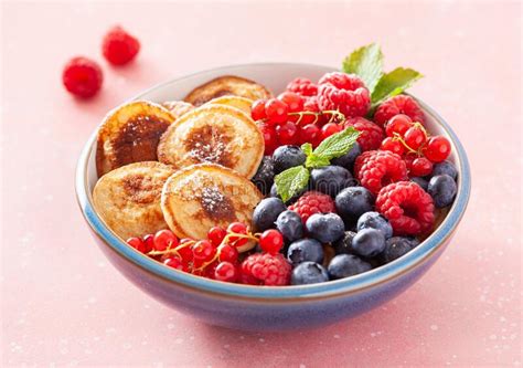 Mini Pancake Breakfast Bowl With Berries And Maple Syrup Stock Photo