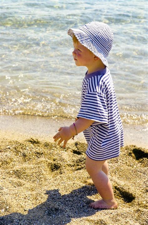 Young Child Boy Enjoys The Beach Stock Image Image Of Cute Child