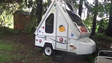 We used a harbor freight one; Aliner Alite Folding Pull Behind Motorcycle Camper - YouTube