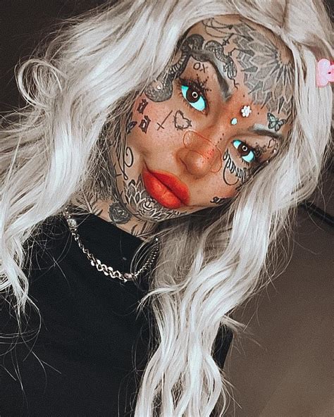 Amber Luke Who Has Spent 50k On 600 Tattoos Covers Them Up To See How She Looks Daily Mail Online
