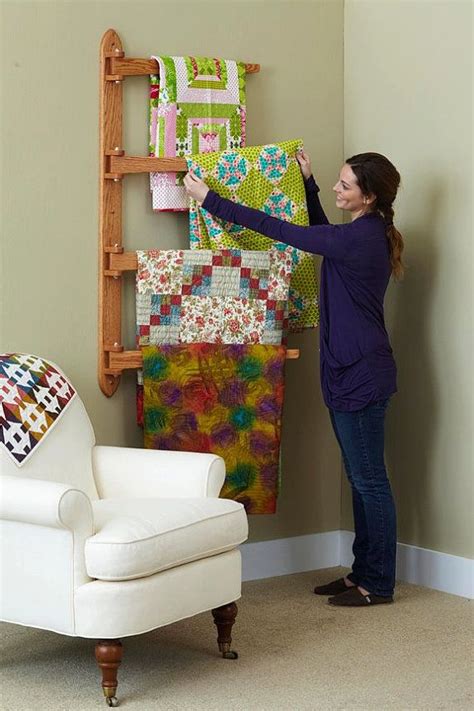 A Hanging Quilt Rack That Holds Four Quilts Great Space Saver Woo
